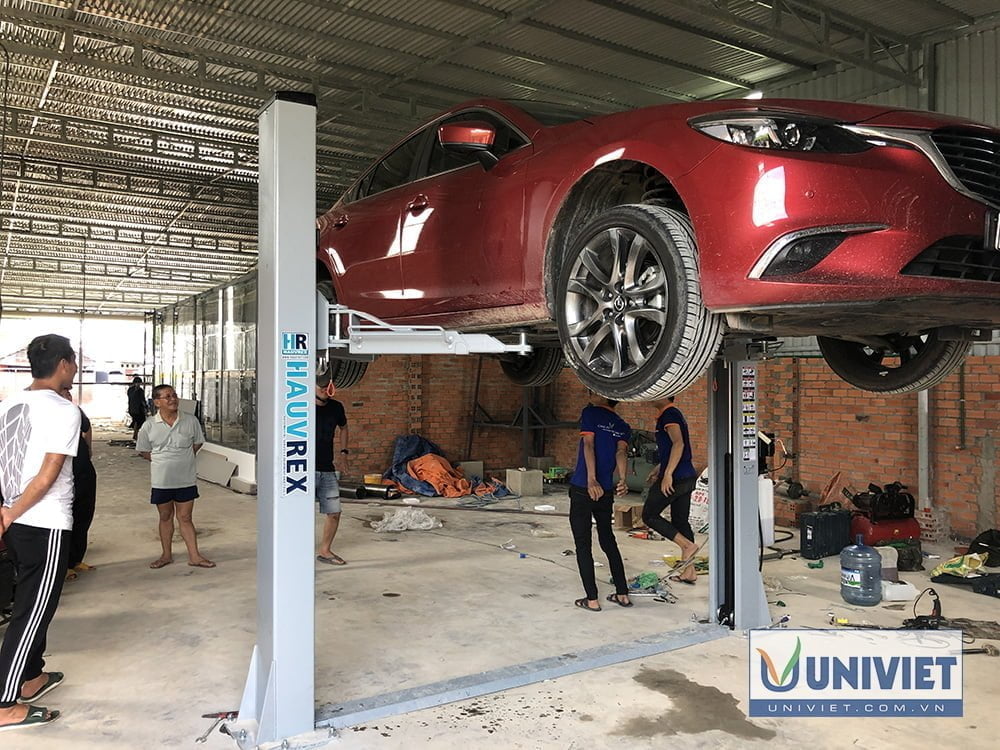 cầu nâng ô tô 2 trụ giằng dưới